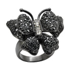 Elegant womens cobalt black ring featuring a butterfly design with sparkling stones