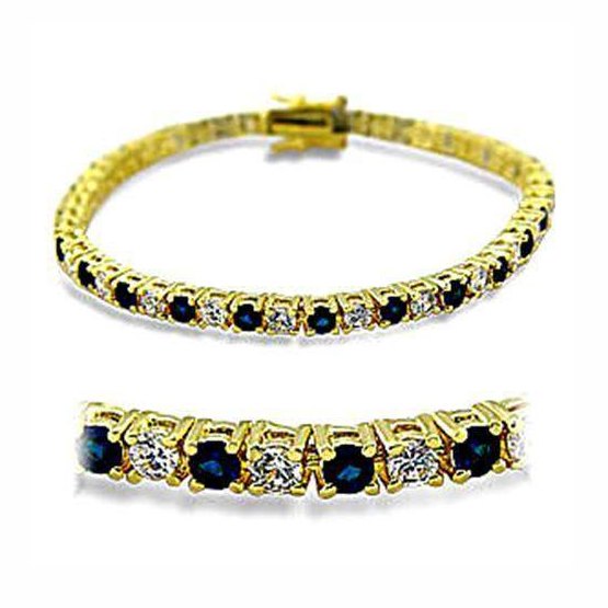 Stylish women's gold and sapphire bracelet with sparkling accents for elegant occasions