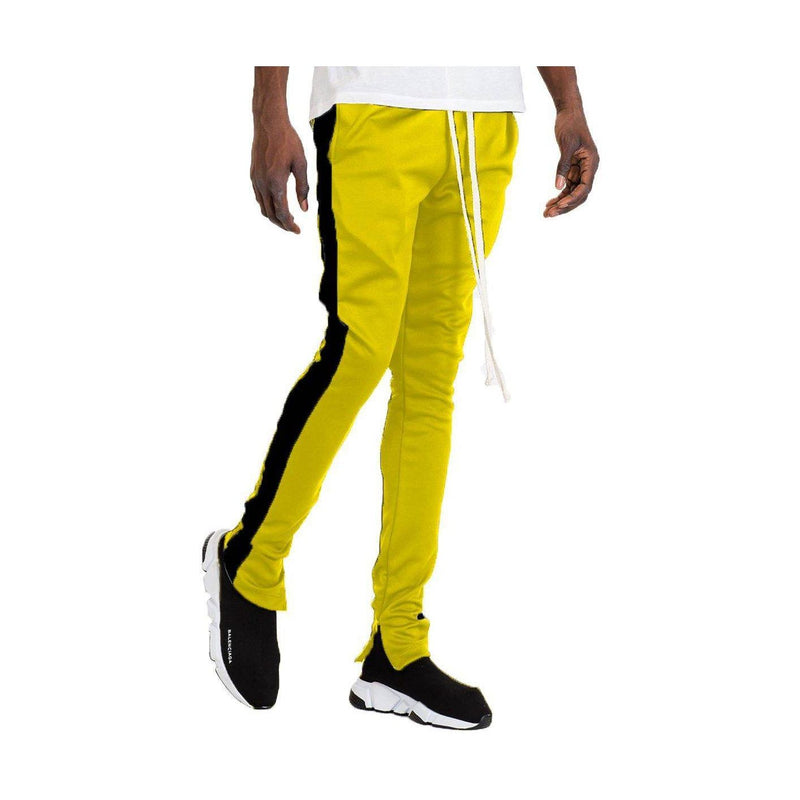 Yellow black slim fit track pants by VacationGrabs with a stylish design for active wear