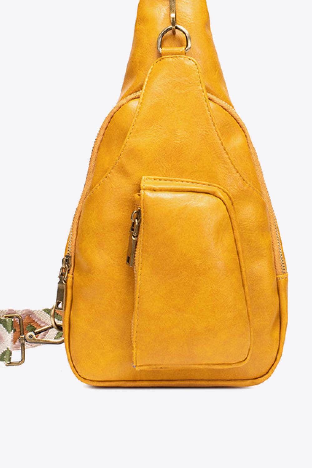 Stylish yellow sling bag with zipper pocket, perfect for daily use and casual outings