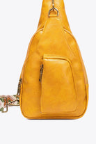 Stylish yellow sling bag with zipper pocket, perfect for daily use and casual outings