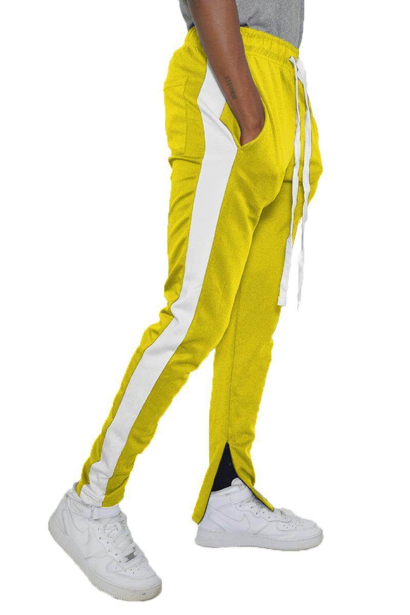 VacationGrabs yellow slim fit track pants with white side stripes and pockets for comfortable wear
