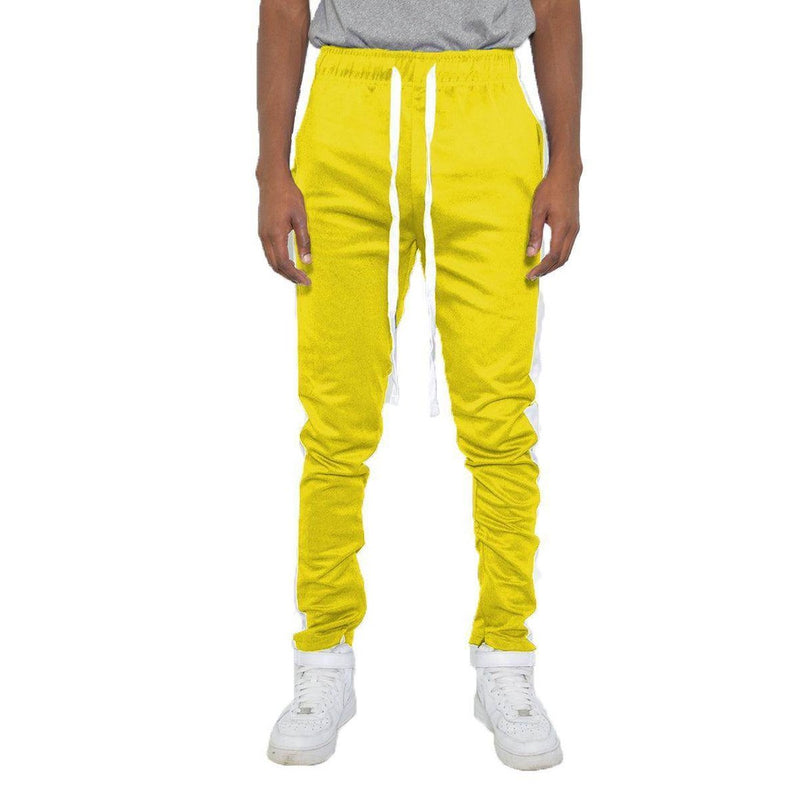 Men's yellow slim fit track pants by VacationGrabs with side stripes and adjustable waistband