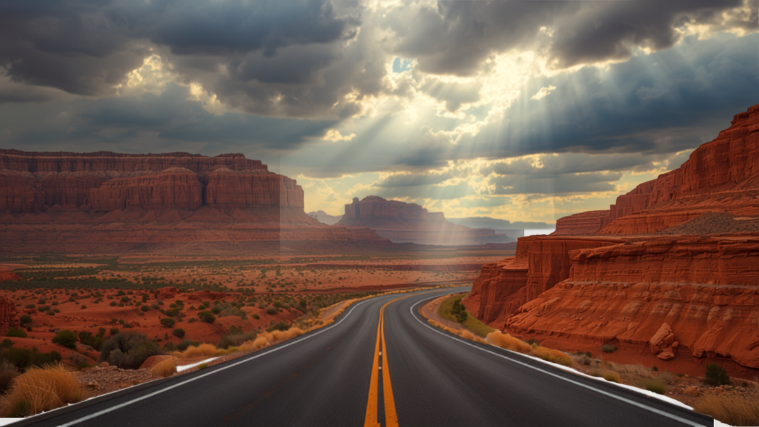 Scenic highway at golden hour through red rock canyons