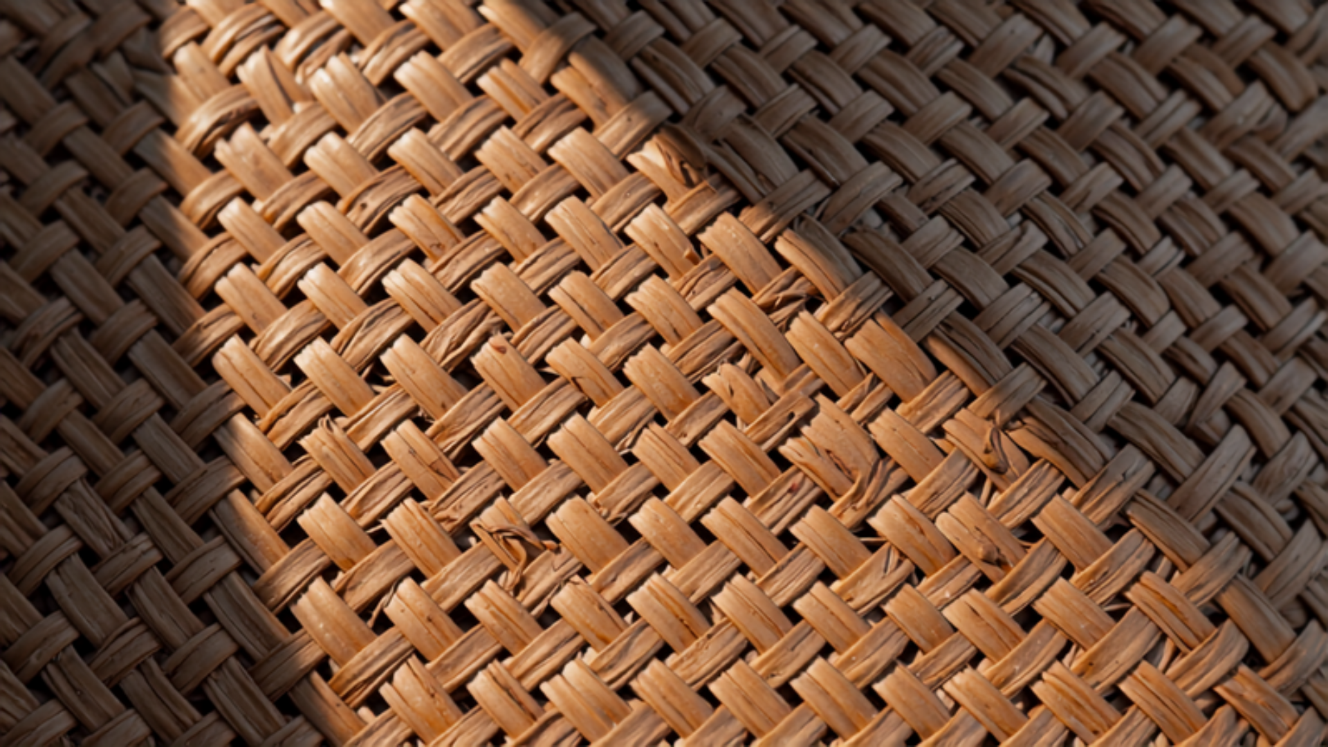 Woven raffia and straw bag texture representing 2026 raffia and woven bag trends
