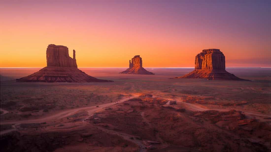 Monument Valley sandstone buttes at sunset