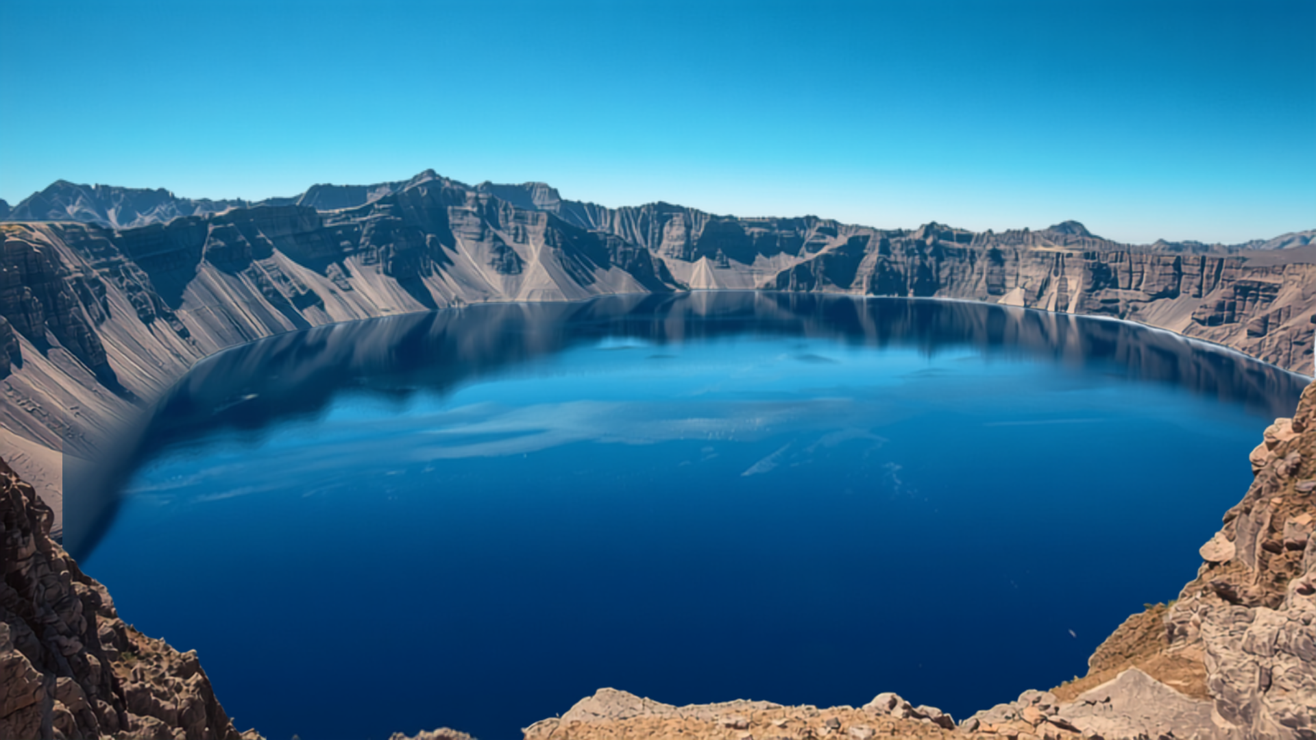 Crater Lake's deep blue volcanic lake surrounded by caldera walls