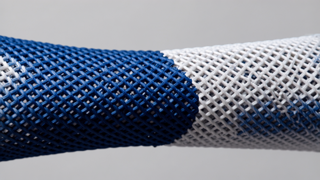 Close-up of athletic mesh jersey fabric texture with ribbed knit pattern
