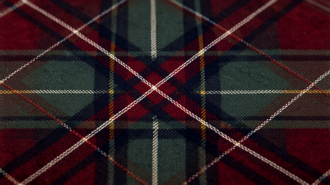Close-up of modern plaid wool fabric weave and tartan pattern texture