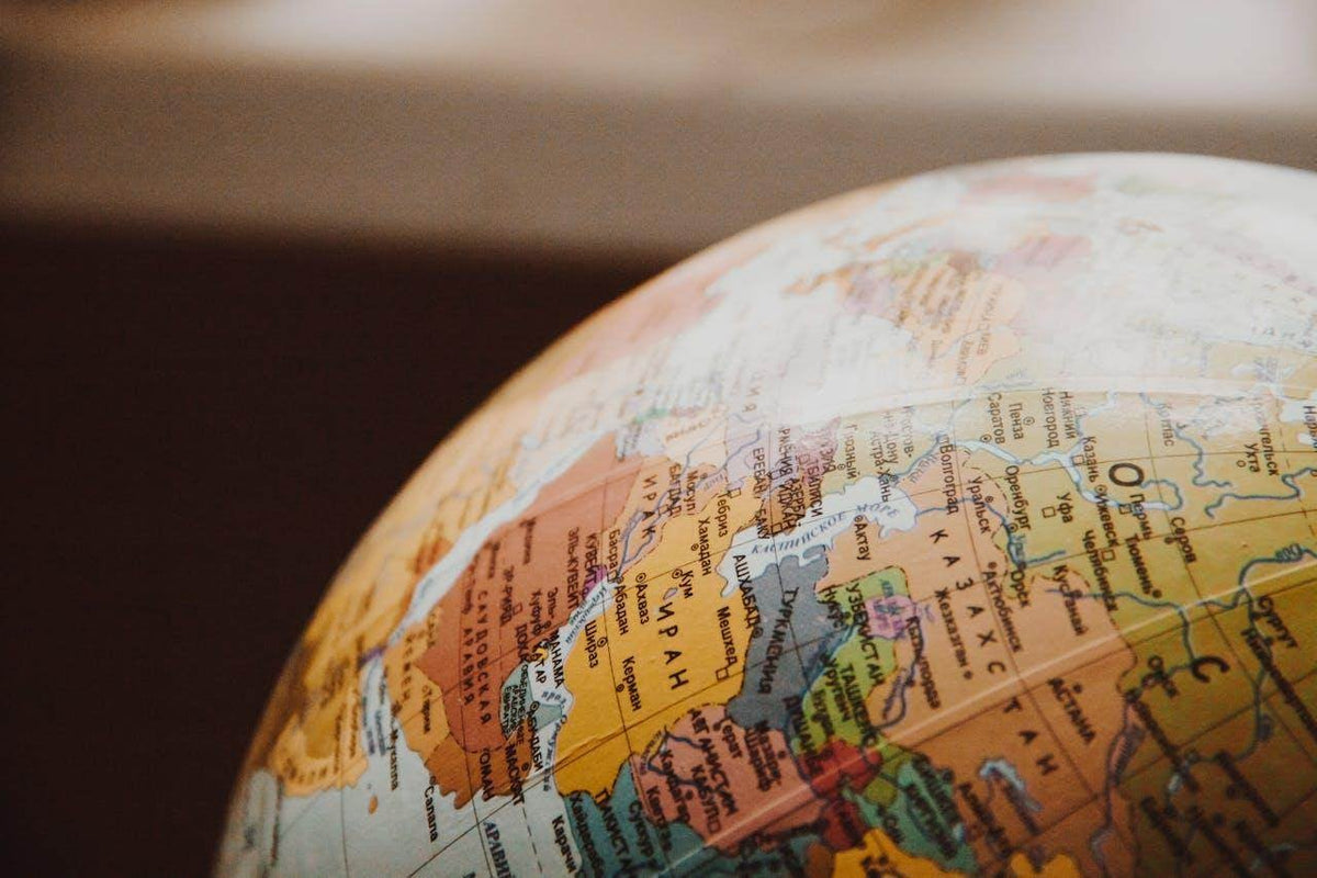 Globe highlighting different regions, emphasizing vacation safety essentials for travelers