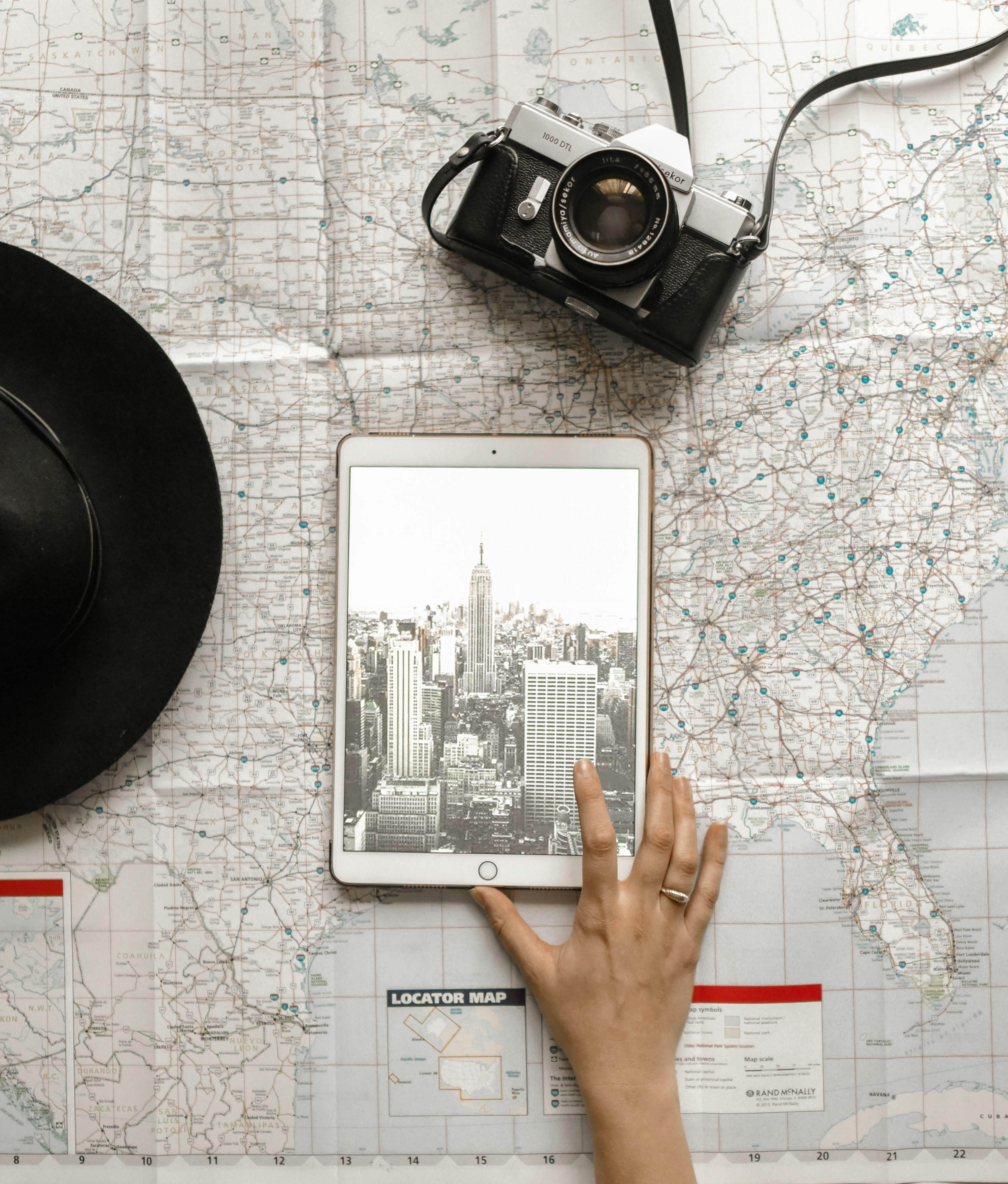 Exploring under-the-radar travel spots with a camera and map for unique vacation planning