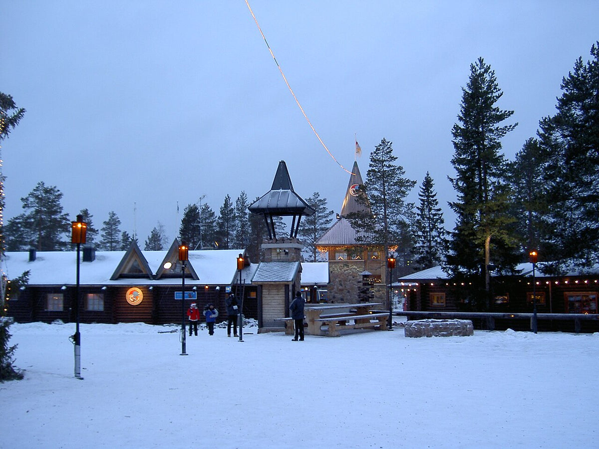 Santa Claus Village at dusk in the snow, Rovaniemi, Finnish Lapland