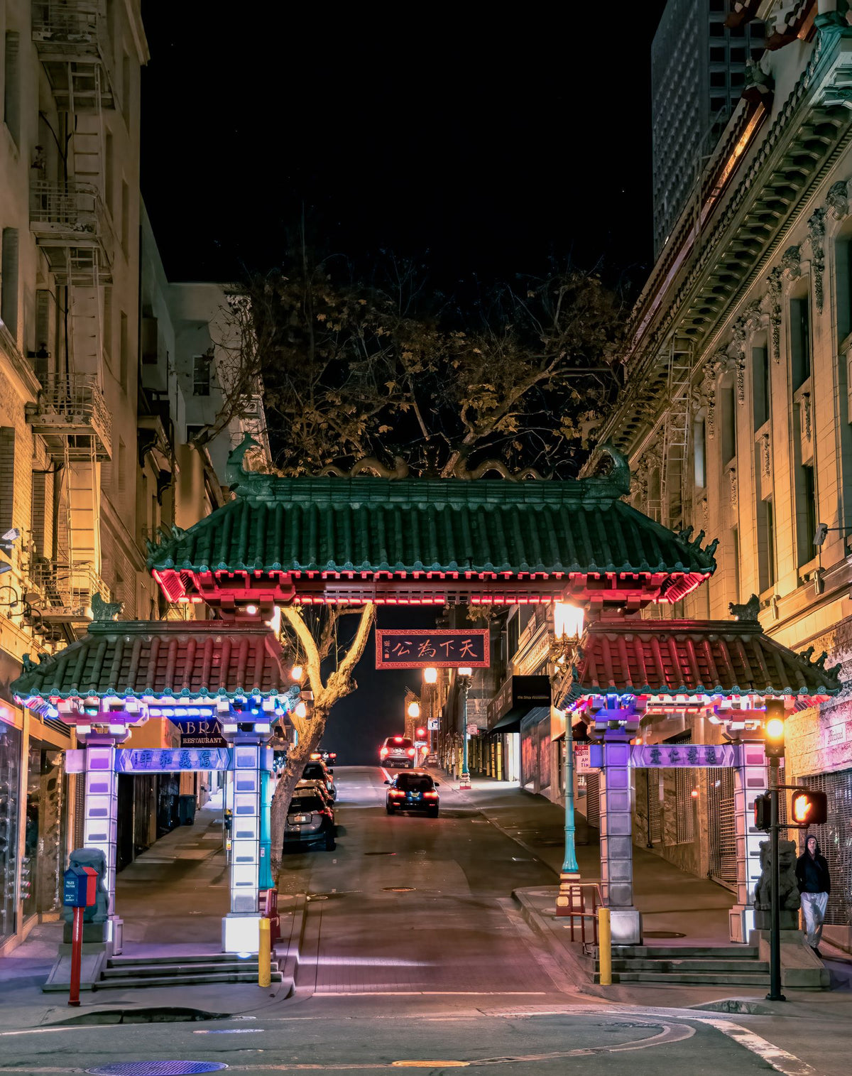 Dragon Gate entrance to Chinatown in San Francisco lit up at night