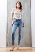 Mid Rise Destructed Skinny Jeans