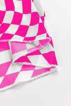 Close-up of JUNIPER BLVD long sleeve checkerboard shirt women in pink and white pattern