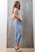 Mid Rise Destructed Ankle Skinny Jeans