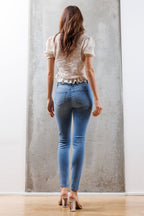 Mid Rise Destructed Skinny Jeans
