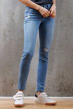 Mid Rise Destructed Skinny Jeans