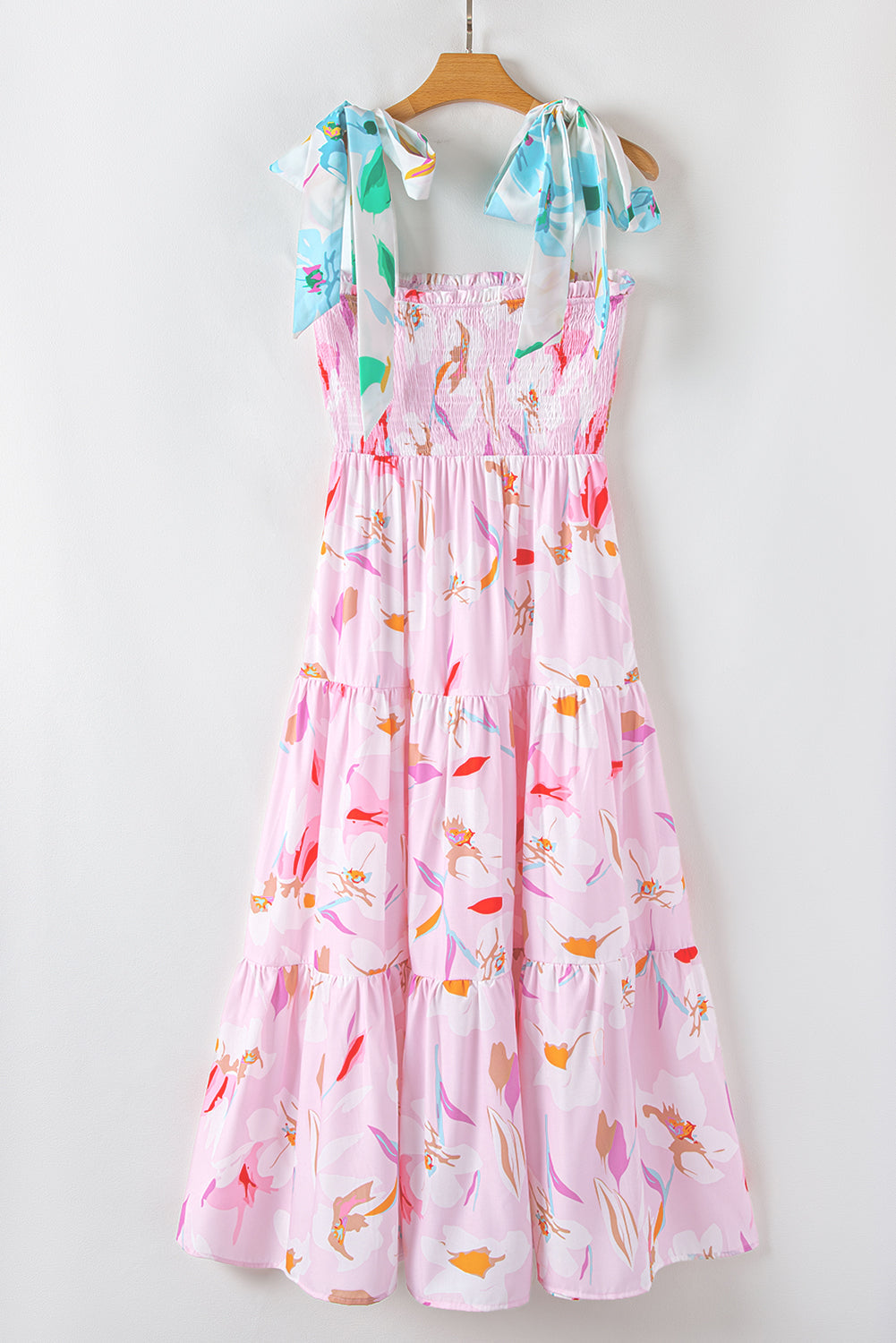 Robe longue smockée à épaules nouées et motif floral