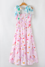 Robe longue smockée à épaules nouées et motif floral