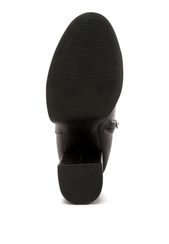 Sole view of chunky heel ankle boots for women by Rag Company with durable rubber traction