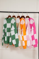 Women's SweatersOrange Checkered Bishop Sleeve Sweater - VacationGrabs