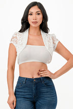 Crochet lace cropped shrug with open front and cap sleeves.