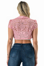 Crochet lace cropped shrug with open front and cap sleeves.