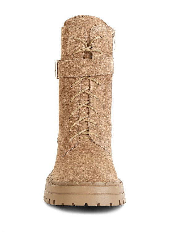 Tan suede lace up boots for women with a stylish design and durable sole for everyday wear