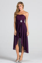 Open back Lace and chiffon surplus dress with waist brooch.
