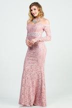 Off the shoulder long sleeve sweetheart sequin lace gown with waist embellishment.