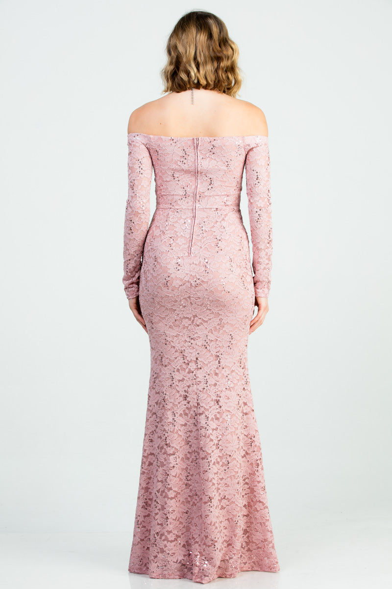 Off the shoulder long sleeve sweetheart sequin lace gown with waist embellishment.