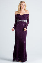 Off the shoulder long sleeve sweetheart sequin lace gown with waist embellishment.