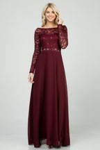 Long sleeve lace and chiffon A-line gown with waist lace embellishment.