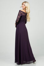 Long sleeve lace and chiffon A-line gown with waist lace embellishment.