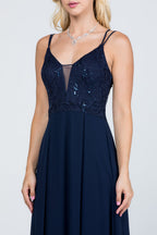 Full length double spaghetti strap sequin lace and chiffon dress with mesh insert on the front. Young contemporary for prom, homecoming graduation or cocktail events