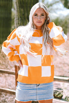 Women's SweatersOrange Checkered Bishop Sleeve Sweater - VacationGrabs