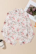 JUNIPER BLVD mock neck floral blouse for women in white with pink floral print and long sleeves
