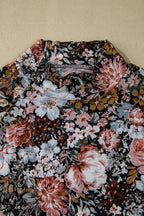 JUNIPER BLVD mock neck floral blouse for women with a vibrant floral design in shades of pink and blue