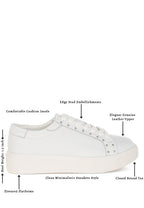 Women's embellished chunky sneakers in white with stud details and elevated platform