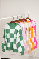 Women's SweatersPink Checkered Bishop Sleeve Sweater - VacationGrabs