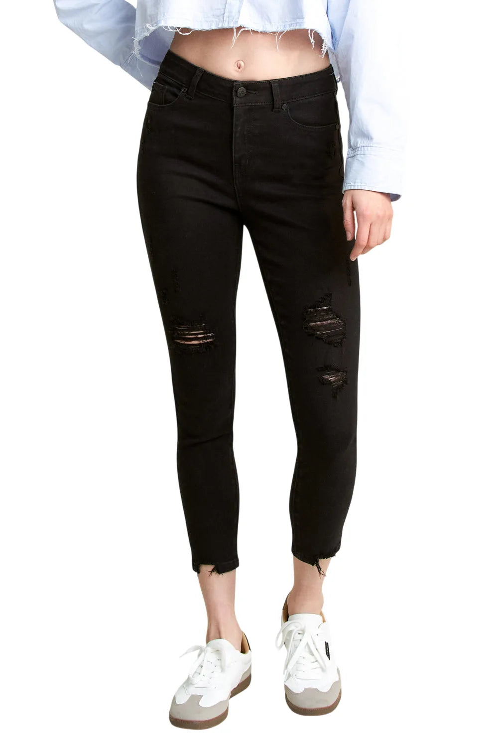 Women's black skinny pants jeans with distressed details for casual wear