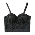 Black beaded bralette on a white background