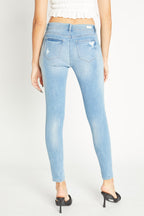 Distressed Mid Rise Ankle Skinny Jeans