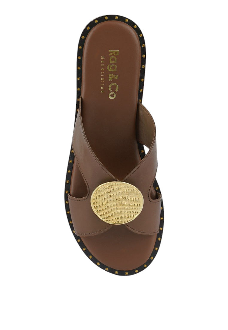 Mules plates ornées de boucles Eudora