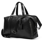 Black leather travel bag with adjustable shoulder strap for versatile use