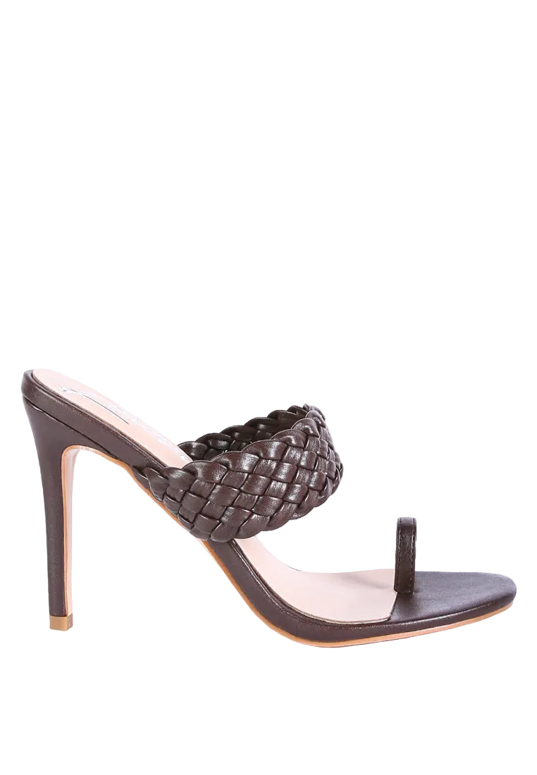 High-heeled sandal with woven design on a white background