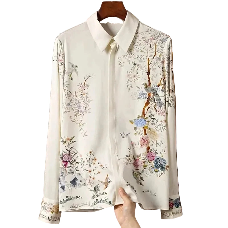 Floral embroidered shirt on a hanger with 
