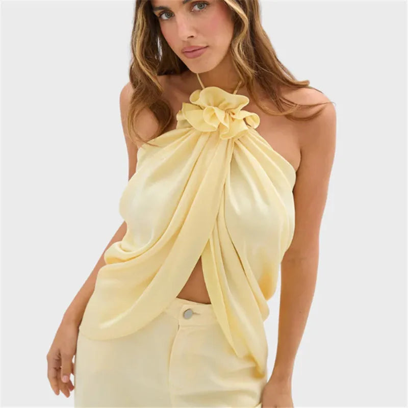 Yellow halter-top with floral detail, perfect for summer outings