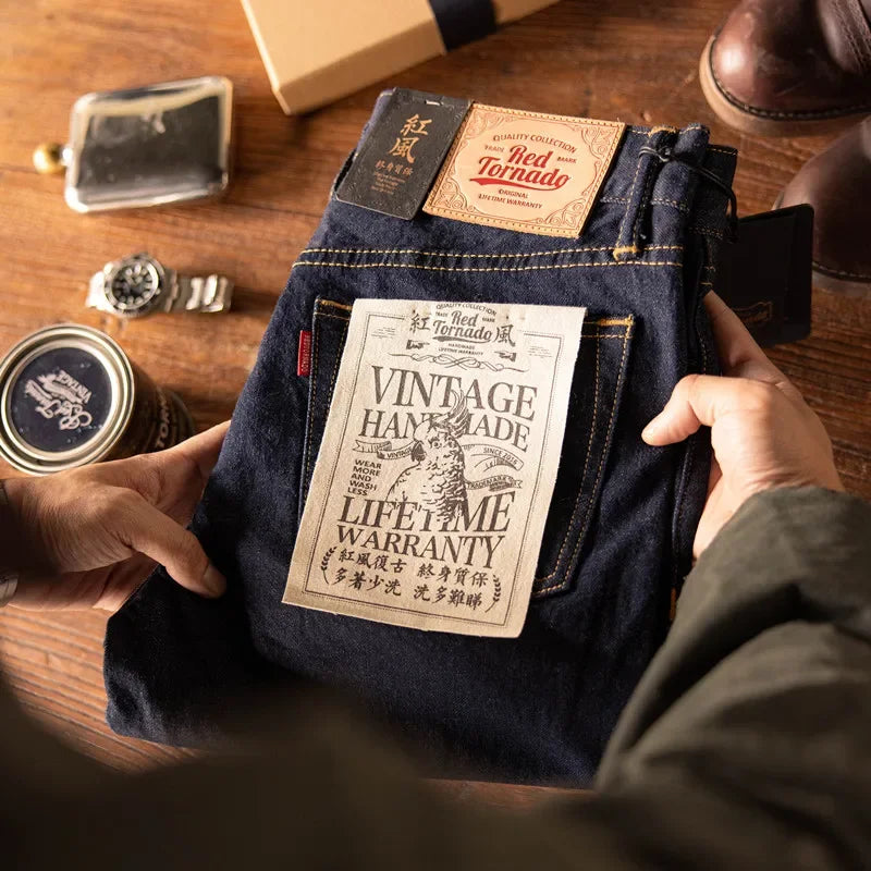 Blue jeans with a vintage label on a wooden surface
